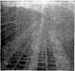VIEW BACK ON THE TRACK.—A SNAP-SHOT TAKEN BY MR. ROBINSON FROM THE REAR PLATFORM OF THE LAST CAR WHEN THE TRAIN WAS RUNNING AT ABOUT EIGHTY MILES AN HOUR.