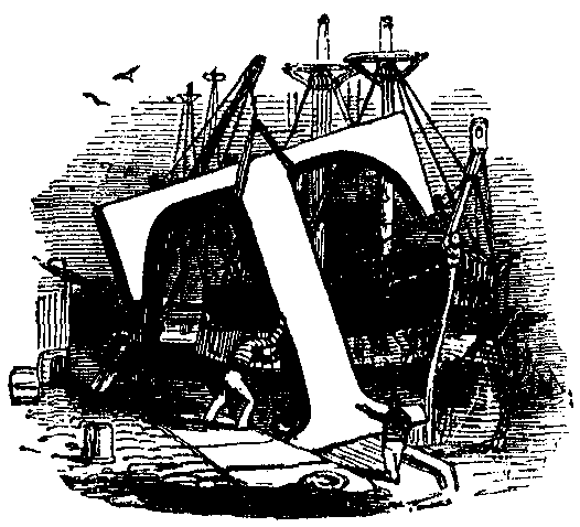 Block and tackle are lifting a 'T' into place.