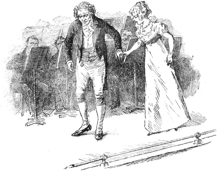 Taking his hand, turned him round to the audience.