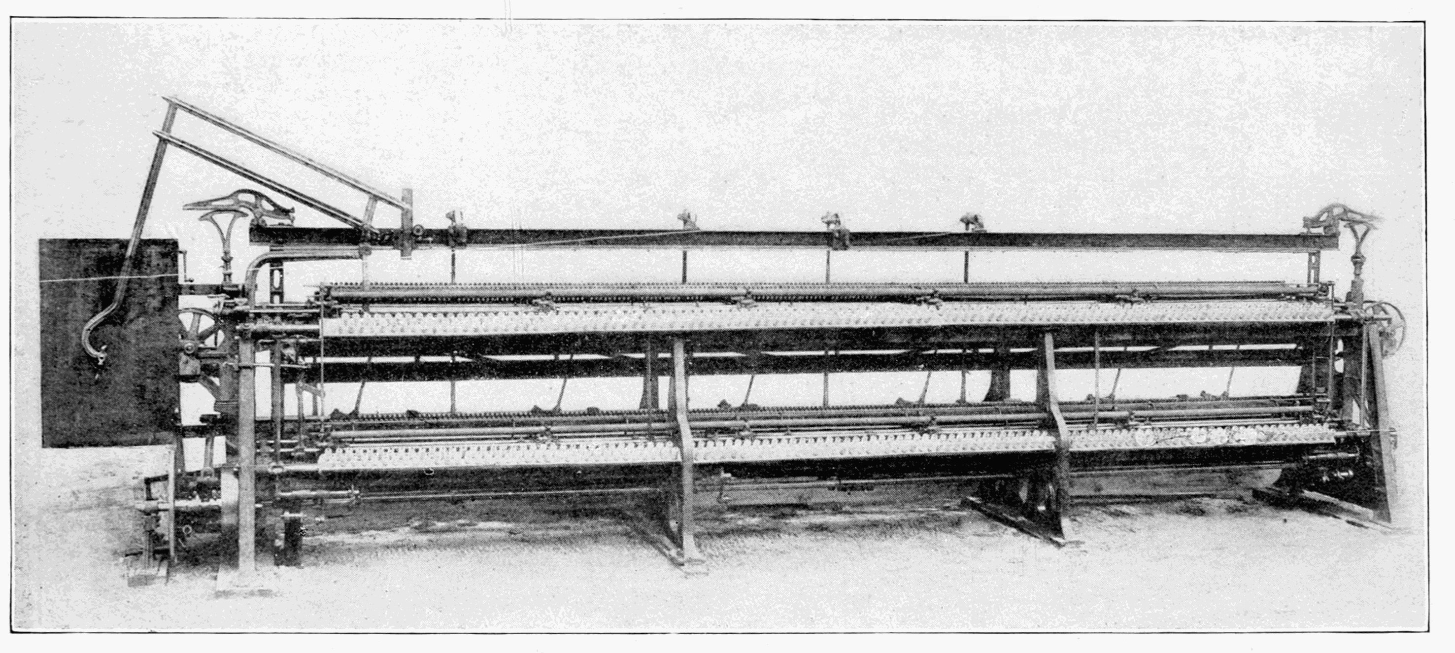 Schiffli or Power Embroidering Machine.