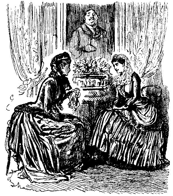 Two women talking.
