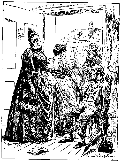 Woman speaking to man.