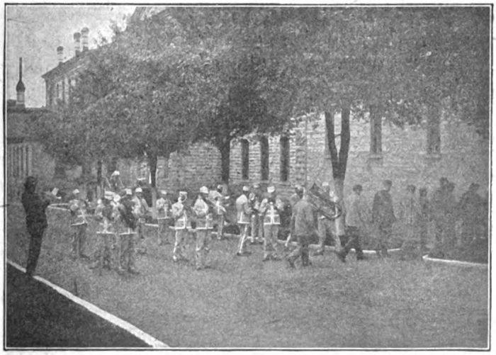 Prisoner's Band with Convicts Entering Cellhouse