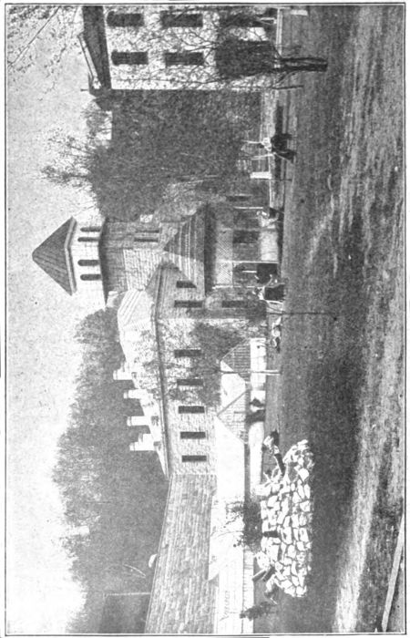 The Hospital in Background, and Sick Prisoners in Park